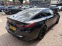 BMW 8-serie Gran Coupé M8 Competition, all black.