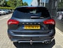 Ford Focus Wagon 1.5 150 PK Automaat ST Line X | TREKHAAK| LEDER| STUUR, STOEL EN VOORRUITVERWARMING| NAVIGATIE + APPLE CARPLAY/ANDROID AUTO| CAMERA + PARKEERSENSOREN| ELEK. KOFFERKLEP| DRAADLOZE TELEFOONLADER| DAB|