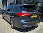 Ford Focus Wagon 1.5 150 PK Automaat ST Line X | TREKHAAK| LEDER| STUUR, STOEL EN VOORRUITVERWARMING| NAVIGATIE + APPLE CARPLAY/ANDROID AUTO| CAMERA + PARKEERSENSOREN| ELEK. KOFFERKLEP| DRAADLOZE TELEFOONLADER| DAB|