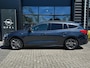 Ford Focus Wagon 1.5 150 PK Automaat ST Line X | TREKHAAK| LEDER| STUUR, STOEL EN VOORRUITVERWARMING| NAVIGATIE + APPLE CARPLAY/ANDROID AUTO| CAMERA + PARKEERSENSOREN| ELEK. KOFFERKLEP| DRAADLOZE TELEFOONLADER| DAB|