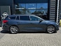 Ford Focus Wagon 1.5 150 PK Automaat ST Line X | TREKHAAK| LEDER| STUUR, STOEL EN VOORRUITVERWARMING| NAVIGATIE + APPLE CARPLAY/ANDROID AUTO| CAMERA + PARKEERSENSOREN| ELEK. KOFFERKLEP| DRAADLOZE TELEFOONLADER| DAB|