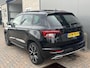 Skoda Karoq 1.5 TSI ACT Sportline / AUTOMAAT/ PANO/ TREKHAAK/ ACC/ PARK.SENSOR.V+A/ CAMERA/ STOELVERWARM./ ELEK.ACHTERKLEP/ SMARTLINK/ DODEHOEK/ KEYLESS/ RIJ-MODI/ DIGITAL DASH/ NAVI/ DAB/ CLIMA/ LED/ 19'' LMV