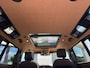 Land Rover Defender 110 and Rover P300e X-Dynamic HSE Midnight Emerald Green Satin | Heritige Customs | Tweed interieurdelen | Custom interieur |