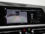 BMW 3-Serie Touring 320e Shadow Line | Camera | Trekhaak | Leder/Stof | DAB | LED | Cruise | Carplay