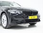 BMW 3-Serie Touring 320e Shadow Line | Camera | Trekhaak | Leder/Stof | DAB | LED | Cruise | Carplay