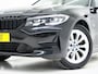 BMW 3-Serie Touring 320e Shadow Line | Camera | Trekhaak | Leder/Stof | DAB | LED | Cruise | Carplay