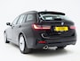 BMW 3-Serie Touring 320e Shadow Line | Camera | Trekhaak | Leder/Stof | DAB | LED | Cruise | Carplay