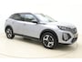 Peugeot e-2008 EV GT 54 kWh | Achteruitrijcamera | Parkeersensoren | Adaptive cruise control | Wireless charging | Navigatie | Airco | Climate control | Stuurbediening | Interieurverlichting | Half stof/leer bekleding | Verkeersbord detectie