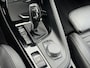 BMW X1 sDrive20i Orange Edition II AUTOMAAT| LEDER SPORT INTERIEUR| PANORAMADAK| CAMERA| NAVIGATIE| AIRCO/ECC | CRUISECONTROL| TREKHAAK| PARKEERSENSOREN