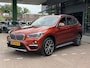 BMW X1 sDrive20i Orange Edition II AUTOMAAT| LEDER SPORT INTERIEUR| PANORAMADAK| CAMERA| NAVIGATIE| AIRCO/ECC | CRUISECONTROL| TREKHAAK| PARKEERSENSOREN