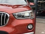 BMW X1 sDrive20i Orange Edition II AUTOMAAT| LEDER SPORT INTERIEUR| PANORAMADAK| CAMERA| NAVIGATIE| AIRCO/ECC | CRUISECONTROL| TREKHAAK| PARKEERSENSOREN