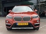 BMW X1 sDrive20i Orange Edition II AUTOMAAT| LEDER SPORT INTERIEUR| PANORAMADAK| CAMERA| NAVIGATIE| AIRCO/ECC | CRUISECONTROL| TREKHAAK| PARKEERSENSOREN