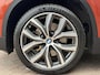 BMW X1 sDrive20i Orange Edition II AUTOMAAT| LEDER SPORT INTERIEUR| PANORAMADAK| CAMERA| NAVIGATIE| AIRCO/ECC | CRUISECONTROL| TREKHAAK| PARKEERSENSOREN