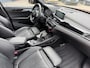 BMW X1 sDrive20i Orange Edition II AUTOMAAT| LEDER SPORT INTERIEUR| PANORAMADAK| CAMERA| NAVIGATIE| AIRCO/ECC | CRUISECONTROL| TREKHAAK| PARKEERSENSOREN