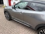 Nissan Juke Hybrid 143pk N-Design/ Apple Carplay/ Camera achter/ DAB/ Keyless entry/ Zwart dak/ Stoel + stuur verwarming/ 1 Eigenaar/ Origineel NL/ NAP