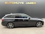 BMW 3-Serie Touring 330e High Executive - M Sport Pano Laser HUD Leder Carplay Memory Virtual