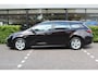 Toyota Corolla Touring Sports 1.8 Hybrid First Edition Plus | Rijklaar | HUD | Apple/Android | Stoel/Stuur-verw. | Adap. Cruise | DAB+ | Clima | Elek. achterklep