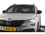 Skoda Karoq 1.5 TSI ACT Sportline Business 150 PK | Dig. Cockpit | Adapt. Cruise | Winterpakket | PDC | Camera | NAV + App. Connect | ECC | Elek. Trekhaak | LM 19" |