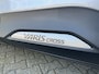 Toyota Yaris Cross 1.5 Hybrid 130 Dynamic all season banden / spatlappen achter