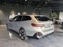 BMW i5 Touring M60 xDrive 84 kWh | M-SPORT PRO | DRIVING ASSIST PROF | PARK ASSIST PROF | PANORAMADAK | STOELVENTILATIE | OXID GRAU | SOH 97 % | COMFORT PAKKET | TRAVEL PAKKET | CARBON PAKKET | HEAD-UP | TREKHAAK |