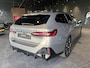 BMW i5 Touring M60 xDrive 84 kWh | M-SPORT PRO | DRIVING ASSIST PROF | PARK ASSIST PROF | PANORAMADAK | STOELVENTILATIE | OXID GRAU | SOH 97 % | COMFORT PAKKET | TRAVEL PAKKET | CARBON PAKKET | HEAD-UP | TREKHAAK |
