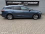 Ford Focus Wagon 1.0 EcoBoost Hybrid Titanium | Clima | PDC V+A | Navi | Privacy Glas | Cruise | Led |