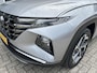 Hyundai Tucson 1.6 T-GDI PHEV Premium Sky 4WD |Trekhaak| Panoramisch schuif/kantel dak | Apple Carplay/Android Auto | Stoelverwarming/verkoeling | Elektrische achterklep | Elektrische verstelbare stoelen met geheugen |