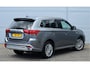 Mitsubishi Outlander PHEV 2.4 INSTYLE 4WD | PLUG IN HYBRID | V2H | SOH % | FULL OPTIONS | SCHUIFDAK | ADAPTIEF CRUISE | ALL SEASON BANDEN | FABRIEKSGARANTIE TOT 23-12-2029* | ALL IN RIJKLAARPRIJS