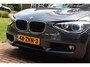BMW 1-Serie 118i Upgrade Edition Aut. | Xenon | Lederen Stoelen | Airco | Navigatie | 17 Inch | Historie | Cruise control |