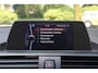 BMW 1-Serie 118i Upgrade Edition Aut. | Xenon | Lederen Stoelen | Airco | Navigatie | 17 Inch | Historie | Cruise control |