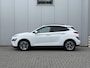 Hyundai Kona Electric EV Premium 64 kWh / Lederen bekleding / Adaptieve cruise control / Dodehoekdetectie / Led Koplampen / Stoelverwarming / HUD /