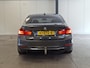 BMW 3-Serie 316i Upgrade Edition (NAP /Trekhaak / Leder)
