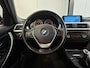 BMW 3-Serie 316i Upgrade Edition (NAP /Trekhaak / Leder)