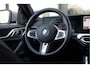 BMW i4 eDrive40 84 kWh | High Executive | M Sportpakket | 19" LM Velgen | Elektrisch verstelbare stoelen | Head-Up Display | Harman Kardon | Achteruitrijcamera | Stoel & Stuurwielverwarming | Comfort Access |