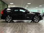 Volvo XC60 T6 AWD Recharge R-Design | Bowers & Wilkins | Stoelventilatie | 360° Camera | Head-Up Display | Adaptieve Cruise Control | Stoelverwarming voor+achter | Stuurwielverwarming | Schuifdak | Pilot Assist | BLIS Dode Hoek Detectie | Elektrische voorstoelen geheugen | Nappa Lederen bekleding | Zitting verlenging voorstoelen | Lederen dashboard | Gelamineerde/geluidwerende zijruiten | 19 Inch | Keyless Drive | Privacy Glass | Elektrisch bedienbare achterklep | DAB Radio | Apple Carplay/Android Auto | Volvo On Call met mobiele App functie | Onyx Black Metallic |