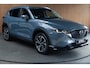 Mazda CX-5 2.0 e-SkyActiv-G M Hybrid 165 HUD Navi 360 ° PDC Stuur- & stoelverwarming Elektr. bedienbare achterklep Climate C. Cruise C. LM velgen Splinternieuw!