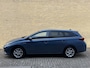 Toyota Auris Touring Sports 1.8 Hybrid Trend | Panoramadak | Climate control | Cruise control | Navigatie | Camera | 16 inch velgen | LED-dagrij | DAB