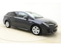 Toyota Corolla 1.8 Hybrid Style Automaat | Navigatie via carplay | Camera | Keyless | Parkeersensoren Extra getint glas | Stuurwielverwarming
