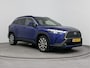 Toyota Corolla Cross Hybrid 140 Business Plus | Dodehoek detectie | Stoelverwarming | Parkeersensoren voor+achter | Elektrische achterklep | Draadloze telefoonlader | Half lederen bekleding |