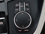 BMW X1 sDrive20i Orange Edition II | Leder | Trekhaak | Head-up | Park assist | Sfeerverlichting | Stoelverwarming | Climate control | Full LED | Navigatie |