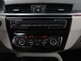 BMW X1 sDrive20i Orange Edition II | Leder | Trekhaak | Head-up | Park assist | Sfeerverlichting | Stoelverwarming | Climate control | Full LED | Navigatie |