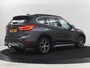 BMW X1 sDrive20i Orange Edition II | Leder | Trekhaak | Head-up | Park assist | Sfeerverlichting | Stoelverwarming | Climate control | Full LED | Navigatie |