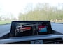 BMW 1-Serie 120i M Sport | Harman Kardon | Schuif/kanteldak | Leder | Camera | DAB | NAP |