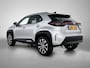Toyota Yaris Cross 1.5 Hybrid 115 First Edition Comfort Pack | BTW voertuig | Dodehoek detectie | Stuur+stoelverwarming | Parkeersensoren voor+achter | Draadloze telefoonlader | Apple CarPlay/Android Auto | Cruise Control Adaptive |