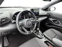 Toyota Yaris Cross 1.5 Hybrid 115 First Edition + | BTW Voertuig | Stoel+stuurverwarming | Draadloze telefoonlader | Apple CarPlay/Android Auto | Climate Control | Cruise Control Adaptive | Achteruitrijcamera |