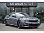 BMW 3-Serie 320e M-sport Dravitgrijs Schuifdak Carbon 19-inch Camera Stoelverwarming