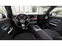 Mercedes-Benz GLB 250+ Business Solution AMG | Vast panoramadak | Trekhaak | Derde zitrij voor twee personen | Stoelverwarming voor | Spiegelpakket | Parkeerpakket