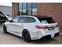 BMW M5 Touring Kreidegrau Ind. | Ultimate Pack | Keramisch | Pano | Trekh | B&W | DA+