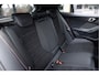 BMW 1-Serie 120 | M Sport Pro | Rosso Corsa Individual | Panoramadak | Harman Kardon | Driving Assistant Plus | Head-Up Display | 19" LM Velgen | M Compound Remsysteem | Elektrisch verstelbare Voorstoelen |