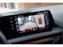 BMW 1-Serie 120 | M Sport Pro | Rosso Corsa Individual | Panoramadak | Harman Kardon | Driving Assistant Plus | Head-Up Display | 19" LM Velgen | M Compound Remsysteem | Elektrisch verstelbare Voorstoelen |